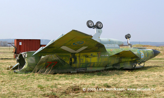 Swedish Attack Aircraft AJ 37 Viggen. Air Force number 37077. Marking from its active time at Wing F7, Såtenäs. Here at the fire and rescue training site at Halmstad.
