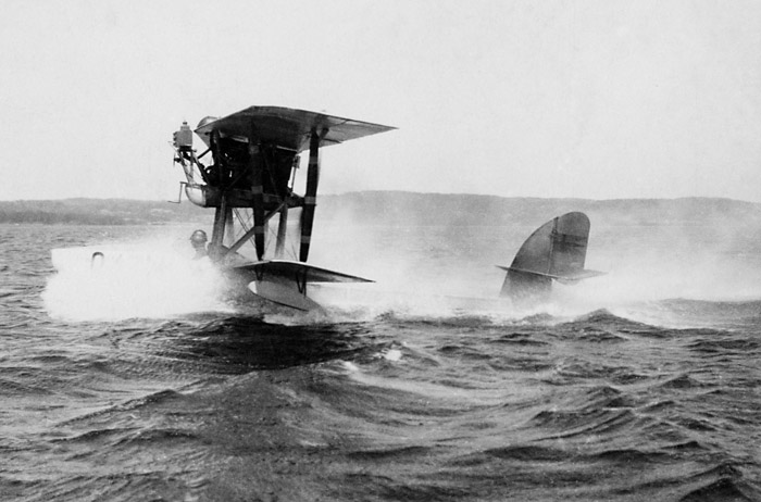 Swedish Army Aviation Hydroplane Macchi M 7 takes off from Lake Roxen. Pilot is the well-known Magnus Bång.